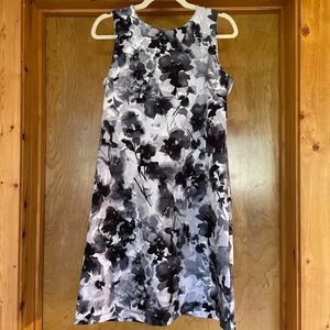 Never worn, DKNY black and white knee length A-line floral dress.